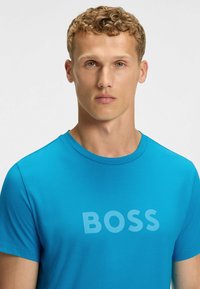 BOSS Strand accessories - turquoise three