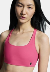 On MOVEMENT - Urheiluliivit: kevyt tuki - pink