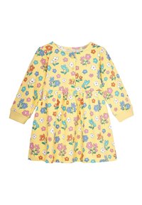 Keltainen kukallinen mekko pitkilla hihoilla, jossa on napitettu etuosa, kerrottu vyötärö ja elävä kuosi monivärisistä kukista.