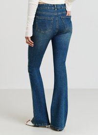 Calliope Flared Jeans - blu denim sabbiato