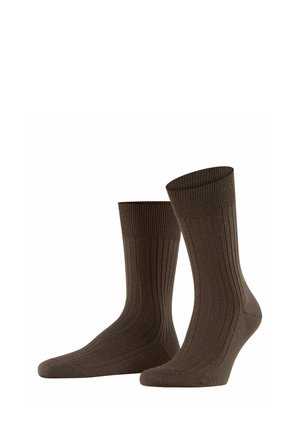 Brown ribbed socks with a medium crew length, featuring a cushioned sole and flexible elasticized tops for a comfortable fit.
