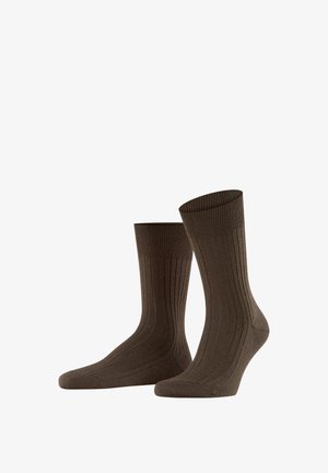 Braune, gerippte Socken mit mittlerer Vereinslänge, ausgestattet mit einer gepolsterten Sohle und flexiblen, elastischen Bündchen für einen bequemen Sitz.