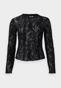 Μακρυμάνικη μπλούζα σε μαύρο και γκρι με σχέδιο φίδι και στρογγυλή λαιμόκοψη, εφαρμοστή σιλουέτα σε λευκό φόντο.