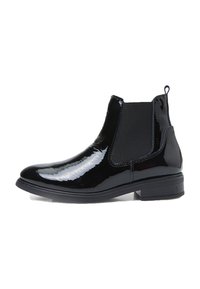 Botas Chelsea de charol negro con paneles laterales elásticos, punta redondeada, tacón bajo y tirador en la parte trasera. Acabado suave y brillante.