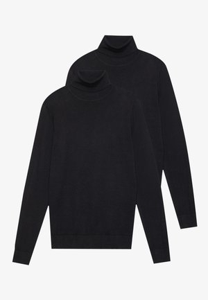 Dos suéteres negros de manga larga y cuello alto, de punto liso, apilados con uno ligeramente detrás del otro sobre un fondo blanco.