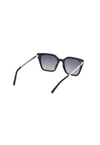 Ochelari de soare negri supradimensionați cu un cadru hexagonal, lenti cu gradient și accente metalice argintii pe mânere; finisaj din plastic lucios.