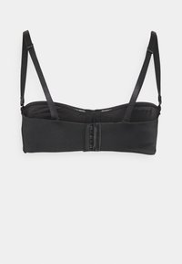 Black bra with a smooth fabric finish, adjustable straps, wide band, and a hook-and-eye closure at the back. Simple and functional design.