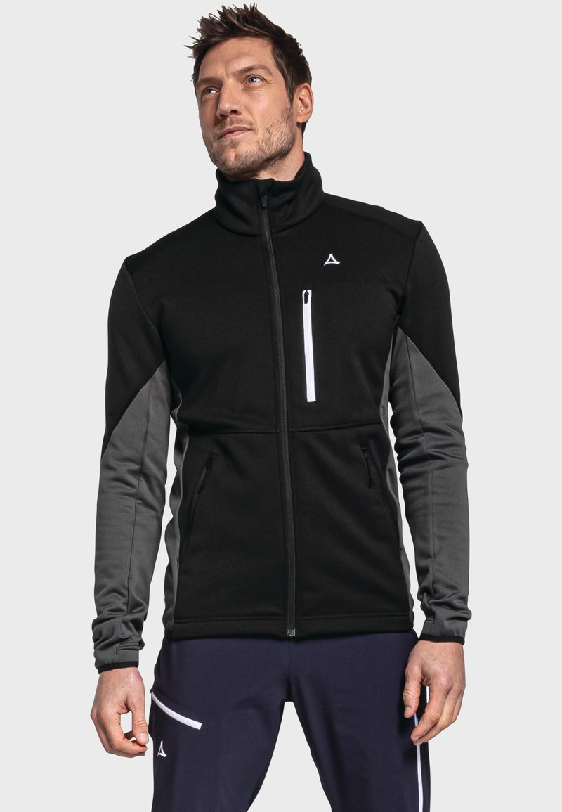 Schwarze und graue Fleecejacke mit hohem Kragen, Frontreißverschluss, zwei Seitentaschen und einer kontrastierenden, mit Reißverschluss versehenen Brusttasche.