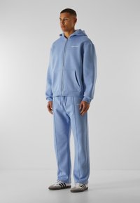 9N1M SENSE SENSE ESSENTIAL FLUFFY - Treniņtērpa apakšdaļas - powderblue