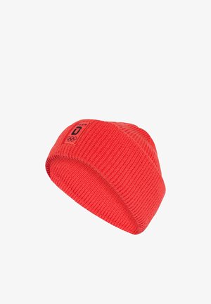 Red knitted beanie with folded edge and a patch featuring the word "TEAM," a "U" symbol, and Olympic rings logo.