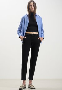 Calliope Chino - nero