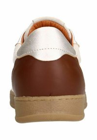 Brown leather sneaker with a metallic silver accent on the heel, featuring a textured rubber sole and stitched detailing on the sides.