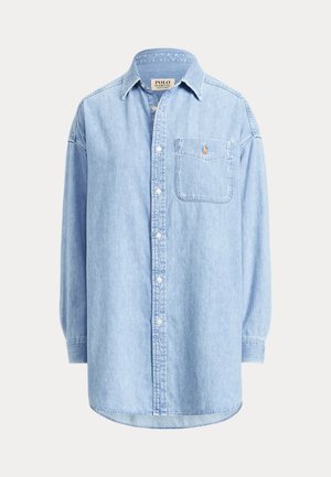 Light blue denim long-sleeve button-up shirt with chest pocket and small embroidered logo above the pocket.