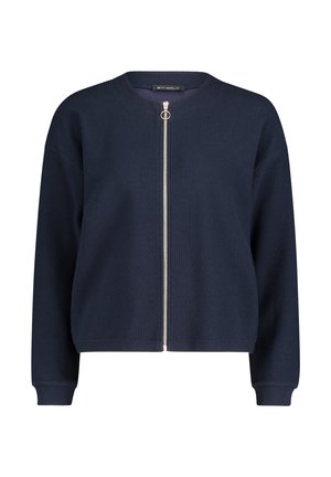 Marineblauwe bomberjack met een gestructureerde stof, ronde hals en zilveren ritssluiting. Voorzien van geribbelde manchetten en zoom voor een aansluitende pasvorm.