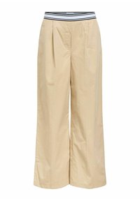 Beige wijde broek met een zwart-witte gestreepte elastische tailleband, met voorplooien en een zachte katoenen textuur.