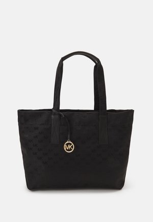 Black tote bag with MK monogram pattern, made from smooth fabric, featuring two sturdy handles and a gold-tone logo charm.