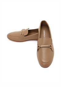 Brown leather loafers with a flat sole, featuring a decorative gold-tone hardware accent and a slightly rounded toe design.