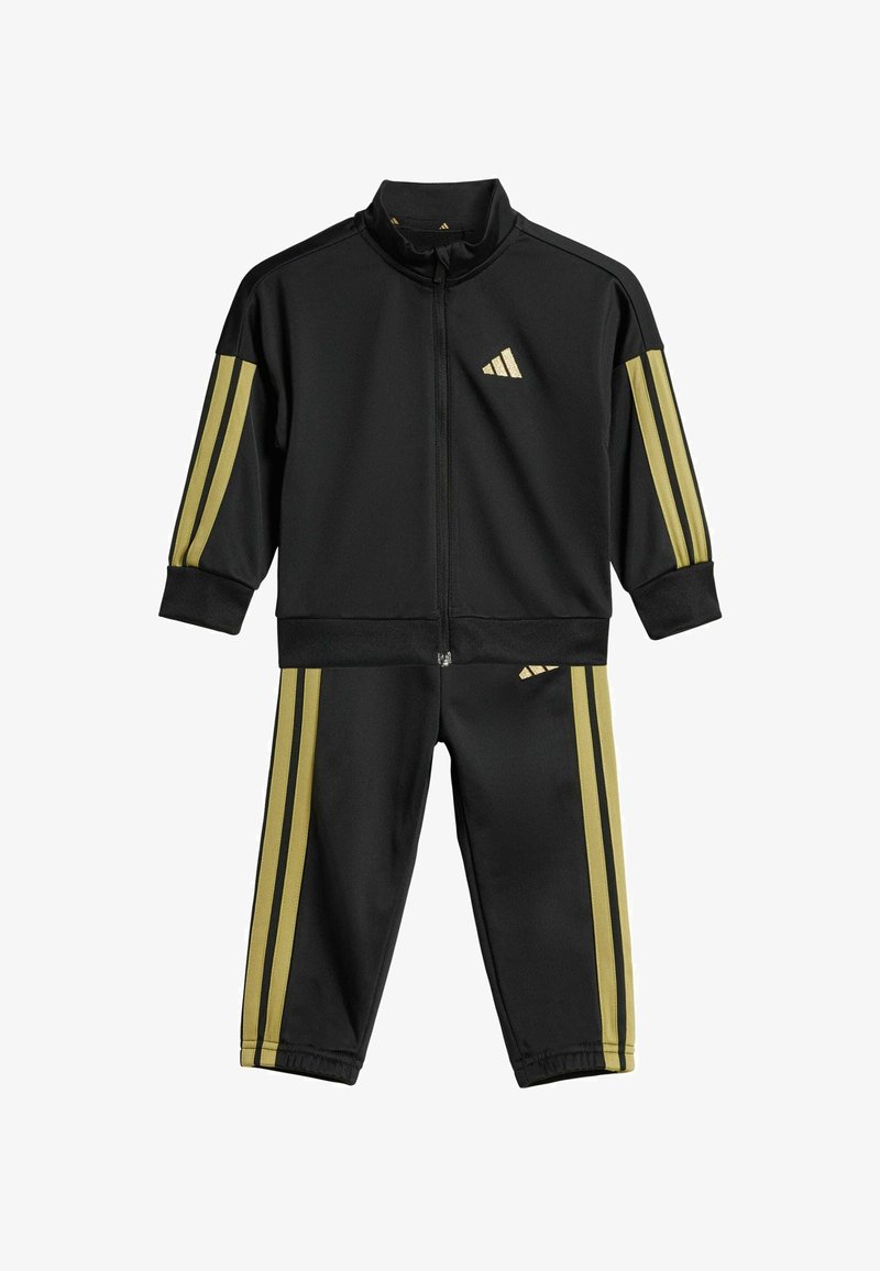 Black tracksuit made of smooth fabric, featuring yellow stripes along the sleeves and legs, and an embroidered logo on the jacket.