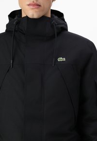 Lacoste Ziemas mētelis - black