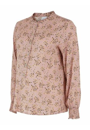 Lyserød langærmet bluse med gul og hvid blomstermønster, knappet front, rynket krave og smockede ærmegab.