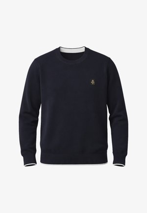 Maglione girocollo blu navy con polsini e orlo a coste, con una piccola toppa logo quadrata sul lato sinistro del petto.