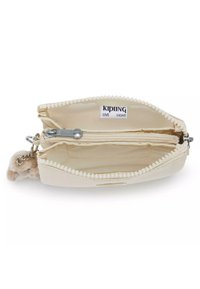 Portafoglio Kipling in bianco sporco con finitura testurizzata, dotato di chiusura a zip, due scomparti e anello per chiavi con pom-pom.