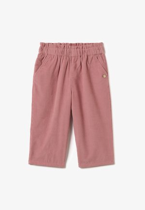 Pantalons en corduroy rose avec taille élastique, poches latérales et un petit charm en métal en forme de fleur sur la poche droite.