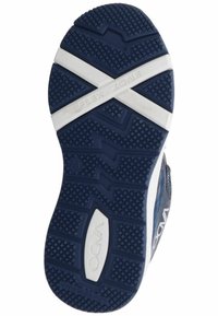 Suola di gomma navy con un motivo testurizzato per una presa migliore. Presenta un accento bianco "FLEX ZONE" e il nome del marchio "VADO" impresso sulla superficie.