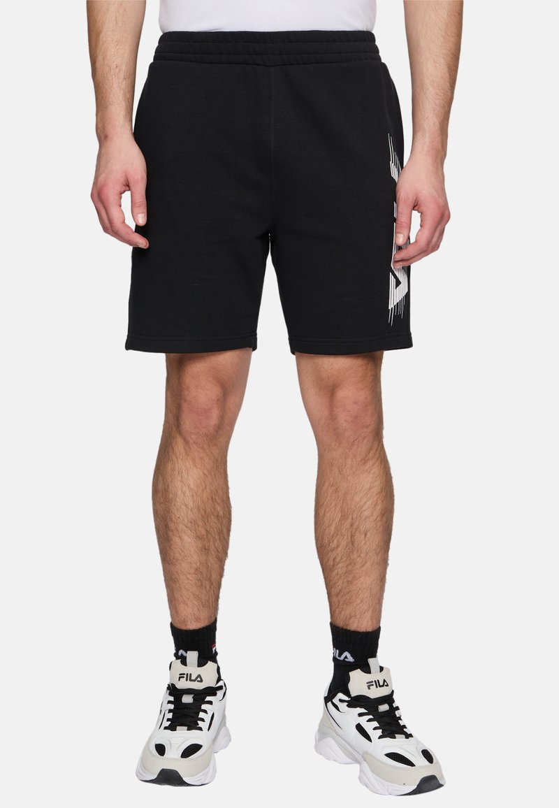 Svarta bomullsjersey-shorts med elastisk midja, rak passform och vitt grafiskt detalj på vänster sida.