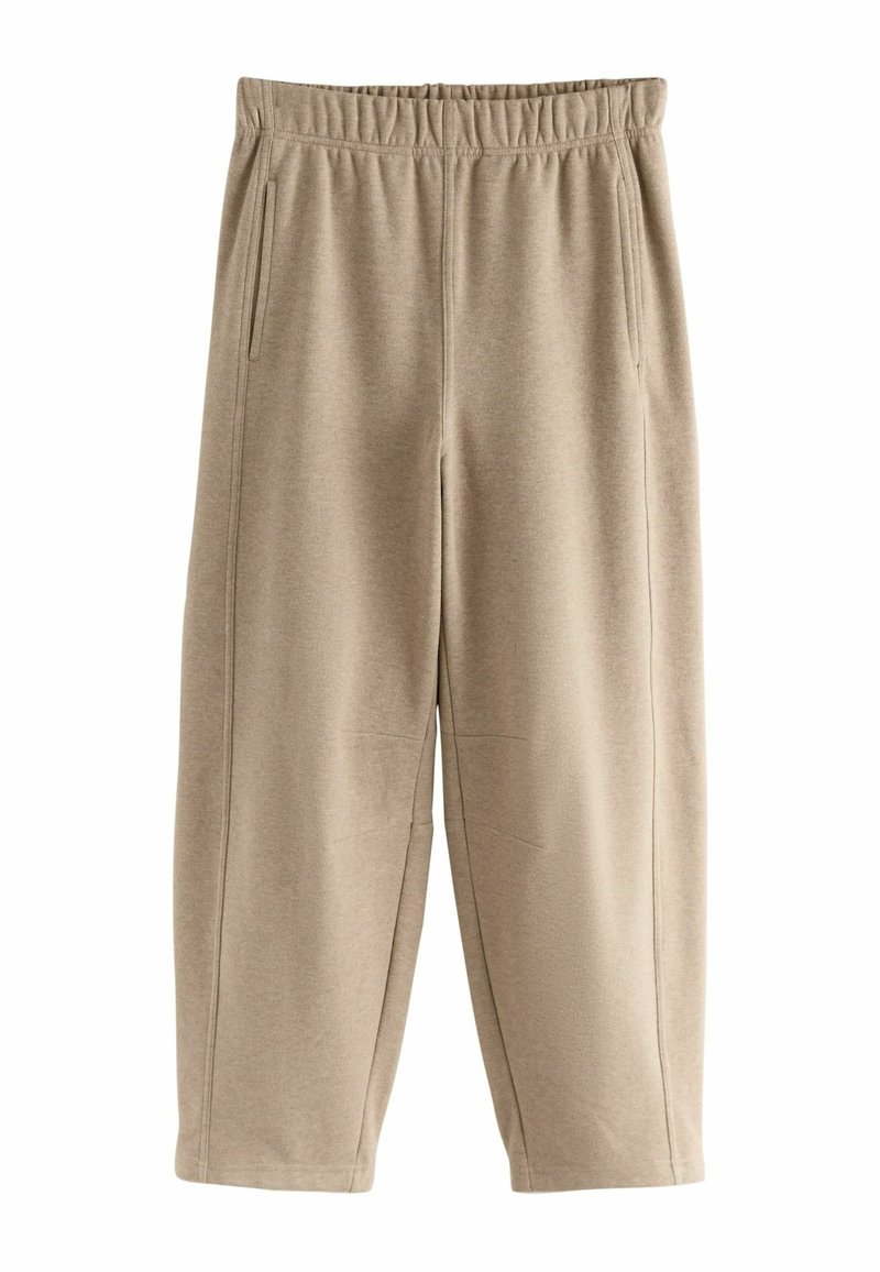 Beige sweatpants with an elastic waistband, side pockets, and a relaxed fit; made of soft fabric with a smooth texture.