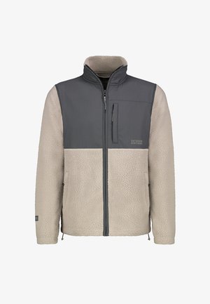 Fleece jacket featuring a beige lower body and gray upper panel. It has a zippered chest pocket and adjustable hem. Soft texture throughout.