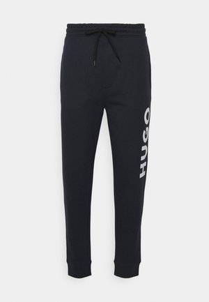 DUTSCHI - Tracksuit bottoms - dark blue