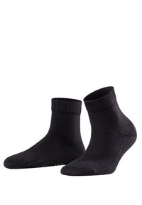 Calze nere alla caviglia realizzate in un materiale liscio ed elastico. Presentano un bordo a coste e una punta senza cuciture per un maggiore comfort. Design semplice e uniforme.