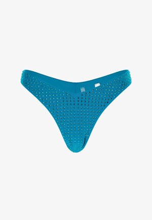 Teal bikini thong with spike accents, featuring a smooth texture and fitted design. The front has a row of small round embellishments.