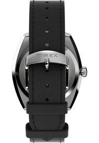 Black leather strap watch with silver hardware, hexagonal case, and textured back; features a push-pull crown and punch hole accents.