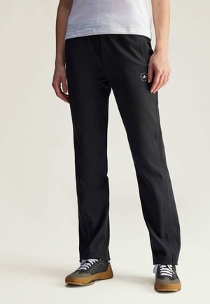 KNITTED TRACK - Pantalon de survêtement - black