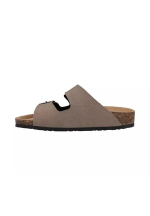 Sandalo scivolato in suede marrone con una larga fascia arcuata, punta aperta e soletta in sughero, caratterizzato da un accento nero sulla fascia e una suola testurizzata.