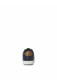 Navy leather sneaker with a contrasting brown accent at the heel, white rubber sole, and textured surface. Rear view focuses on details.