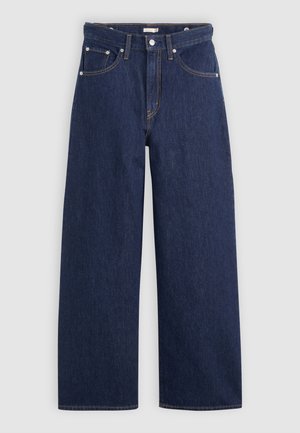 Jeans de ganga de perna larga azul escura com cintura alta, apresentando cinco bolsos, passantes para cinto e detalhes em costura cobre. Textura suave.