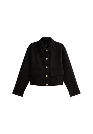 Schwarze, kurz geschnittene Jacke aus einem Stoff mit glatter Textur, mit einem spitzen Kragen, goldenen Knöpfen und zwei Vorderaschen.