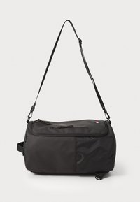 Black duffel bag with a durable fabric, adjustable shoulder strap, top zip closure, and a side mesh pocket for additional storage.