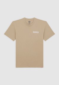 Beige cotton t-shirt with short sleeves, round neckline, and white "DICKIES" text printed on the left chest. Square hem at the bottom.