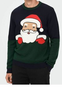 Maglione verde e blu marino con un design stilizzato di Babbo Natale che indossa un cappello rosso, una barba bianca e guanti rossi, texture lavorata a maglia, colletto a girocollo.