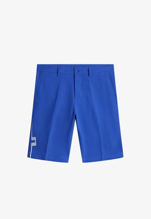 Blauwe shorts met een vlakke voorkant, voorzien van zijzakken en een contrasterend wit geometrisch patroon op het linkerpoot.