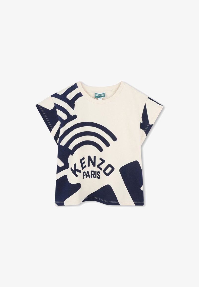 T-shirt beige avec des motifs abstraits navy surdimensionnés et le texte "KENZO PARIS." Manches courtes et coupe décontractée, fabriquée en tissu en coton doux.