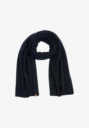 Navy blue scarf made of soft fabric, featuring a long, rectangular shape with rolled edges and a small branded tag on one end.