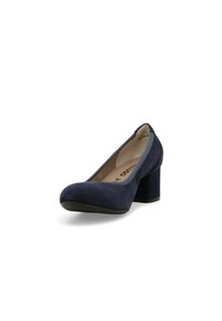 Décolleté in camoscio blu navy con punta rotonda e tacco spesso. Presenta una texture liscia e un bordo di un colore più chiaro in contrasto.