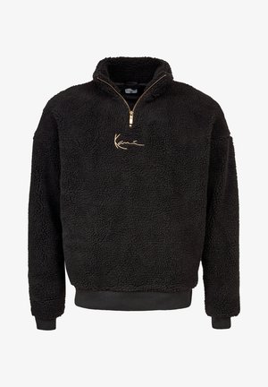 Black fleece pullover with a half-zip front and high collar. Features a gold embroidered logo and ribbed cuffs and hem. Soft, textured finish.