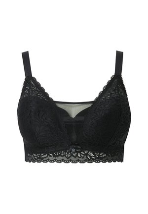 Černá krajková braletka s průsvitnými panely, vroubkovanými okraji a nastavitelnými ramínky. Má dekorativní mašličku uprostřed a složité květinové vzory.