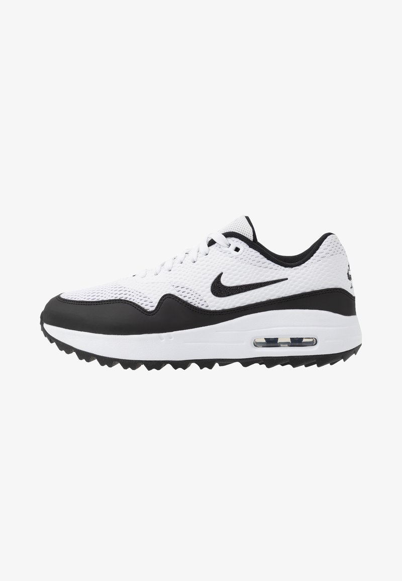 Baskets Nike Air Max blanches et noires avec tige en mesh, coussin d'air visible dans la semelle et logo swoosh noir sur le côté sur fond blanc.